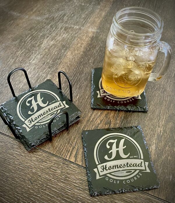 “Engraved in Stone, Remembered Forever — Custom 4" Slate Coasters That Make Every Sip Look Sharp.”